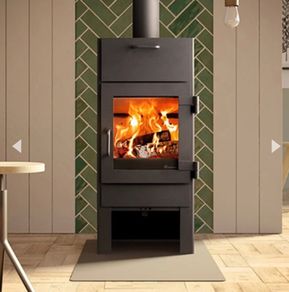 Wood burning stove with oven and double skin flue