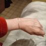 Silver tone adjustable bracelet with charms Image 4