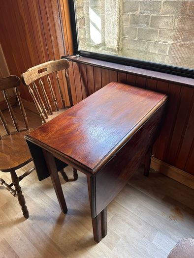 Wooden dining table and six chairs