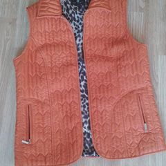 Orange jacket with no sleeve
