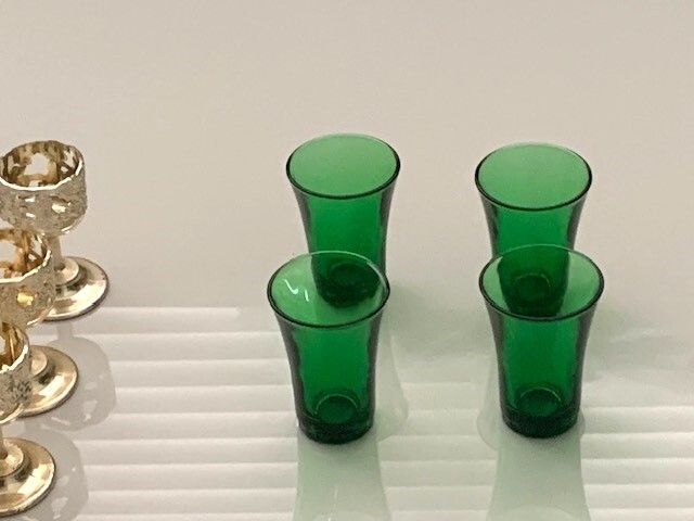 Mid Century green glass liqueur or shot glasses