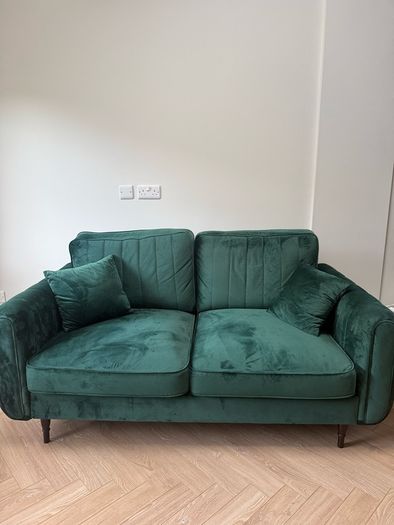 Green velvet sofa