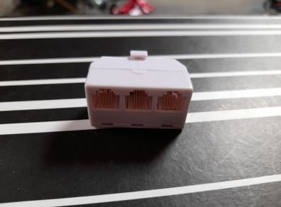 Triple phone Adapter. Free Postage!