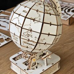 Quirky, fun, wooden wood world globe, functional movement