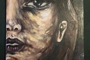 Small painting of a girl's face