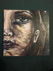 Small painting of a girl's face