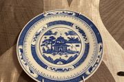 Plate with wall hanger included.