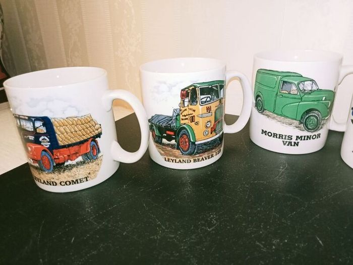 collection of six automotive mugs