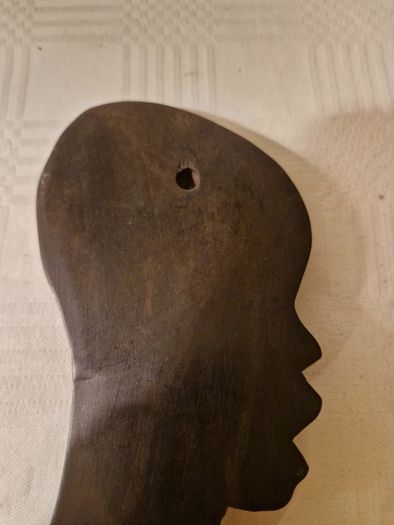 African carved black wood profile silhouette wall hanging