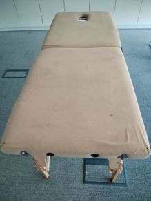 Massage table