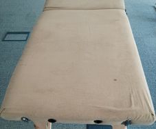 Massage table