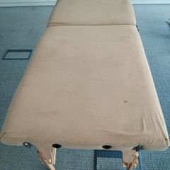 Massage table