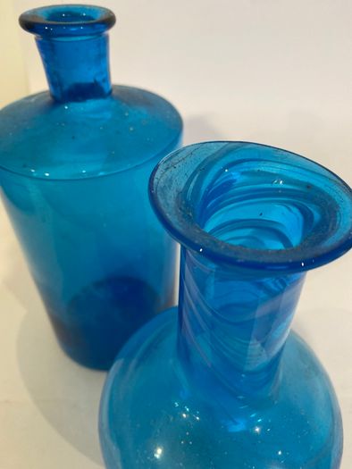 2 vintage blue bottles