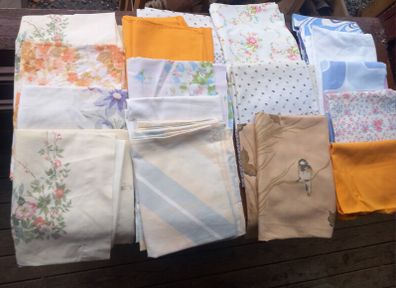 17 vintage pillow cases, D18 post 8e, theatre tv film props
