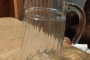 Luminarc glass pitcher with a ribbed design.