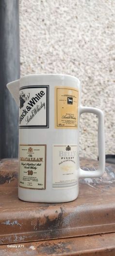 Scotch whiskey advertising jug, unusual with 4 brands on it ,nice to any collectors collection, lovely display item, price includes post to anywhere in Ireland thank you, sold as is