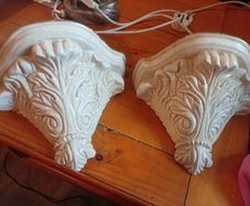 Twin pair of wall shelves