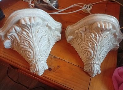 Twin pair of wall shelves