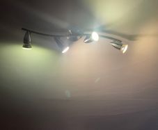 4 LED Ceiling Spotlights on a curved bar.