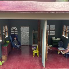 Solid dolls house with furniture