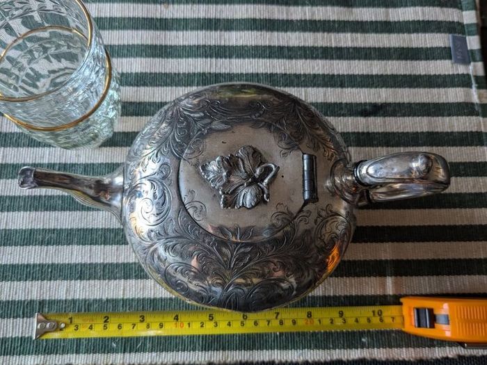 Silverware antique teapot