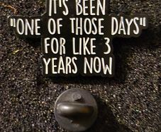 One of those days , pin back badge.