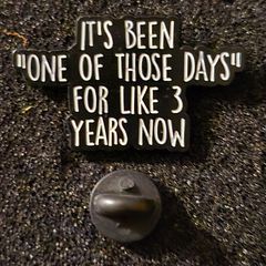 One of those days , pin back badge.