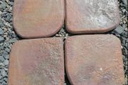Outdoor exterior paving tiles in rusty red terracotta