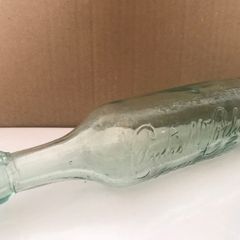 Round bottom C & C bottle