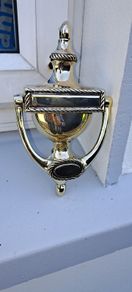 old brass door knocker