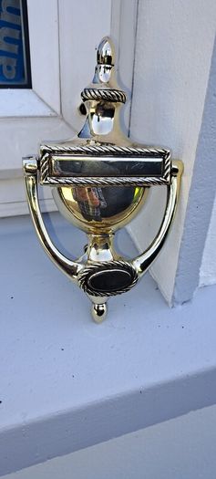 old brass door knocker
