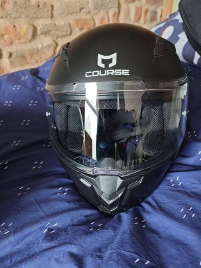 pair of helmets, one full face one open face