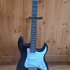 Electric guitar plus case and amp and other pieces