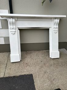 Cast iron mantlepiece and inset.