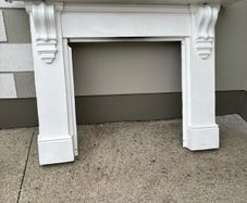 Cast iron mantlepiece and inset.