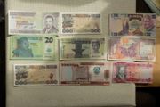 Lot of 9 Uncirculated Banknotes from Africa.Picturesque,Clean,Crisp,Bright condition.No 12.