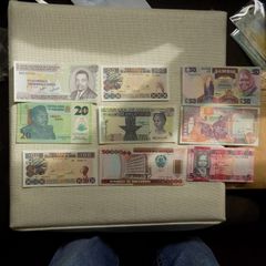 Lot of 9 Uncirculated Banknotes from Africa.Picturesque,Clean,Crisp,Bright condition.No 12.