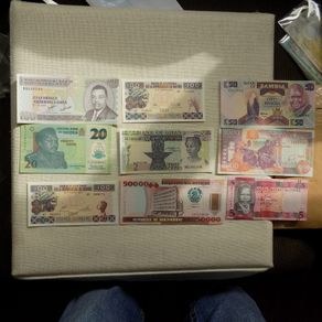 Lot of 9 Uncirculated Banknotes from Africa.Picturesque,Clean,Crisp,Bright condition.No 12.
