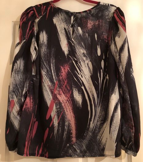 James Lakeland top
