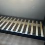 1 Black wooden framed single bed Image 2