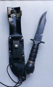 Vintage 1980s Survival Knife with compass and a storage compartment in the knife handle