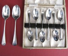 Eight Sterling Antique Silver Spoons.