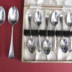 Eight Sterling Antique Silver Spoons.