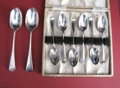 Eight Sterling Antique Silver Spoons.