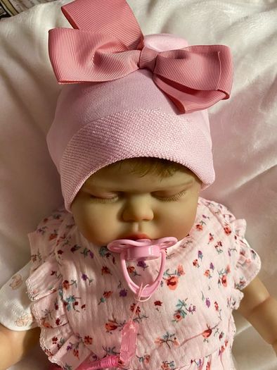 doll.       Reborn baby doll very cute COMES WITH A XMAS OUTFIT