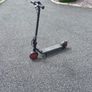 Nine bot e scooter with leds lights on the bottom of the frame. It's able to fold to make it easy to transport Image 9