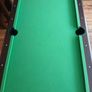 Pool table with cues and balls Image 7