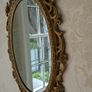 Ornate gold oval wall mirror Image 2