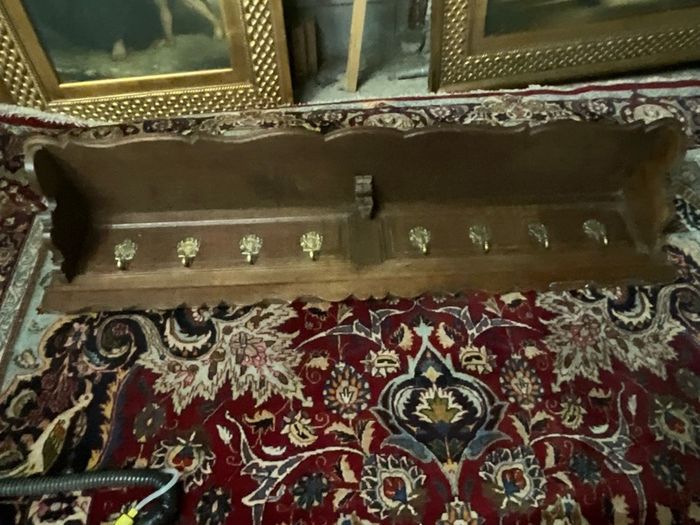 Old coat rack with brass hooks, large and heavy