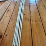 Five white extendable net curtain rods Image 3